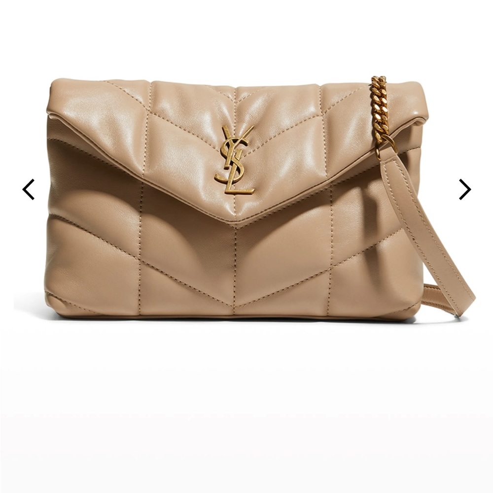 • Saint Laurent "LouLou" crossbody bag 
with 22.4" drop.
6.1"H x 9"W x3.3 d